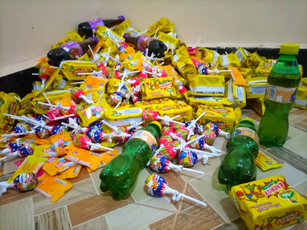 A pile of wrapped sweets, lollipops and biscuits for Christmas
