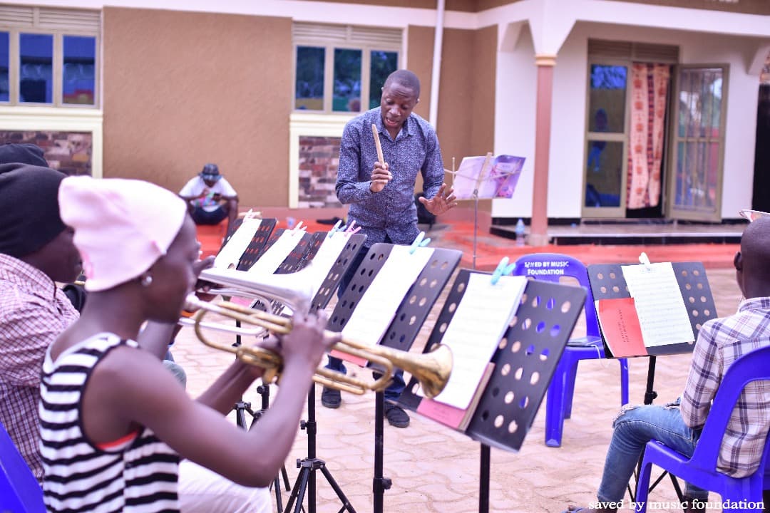 A girl playing trumpet during practice