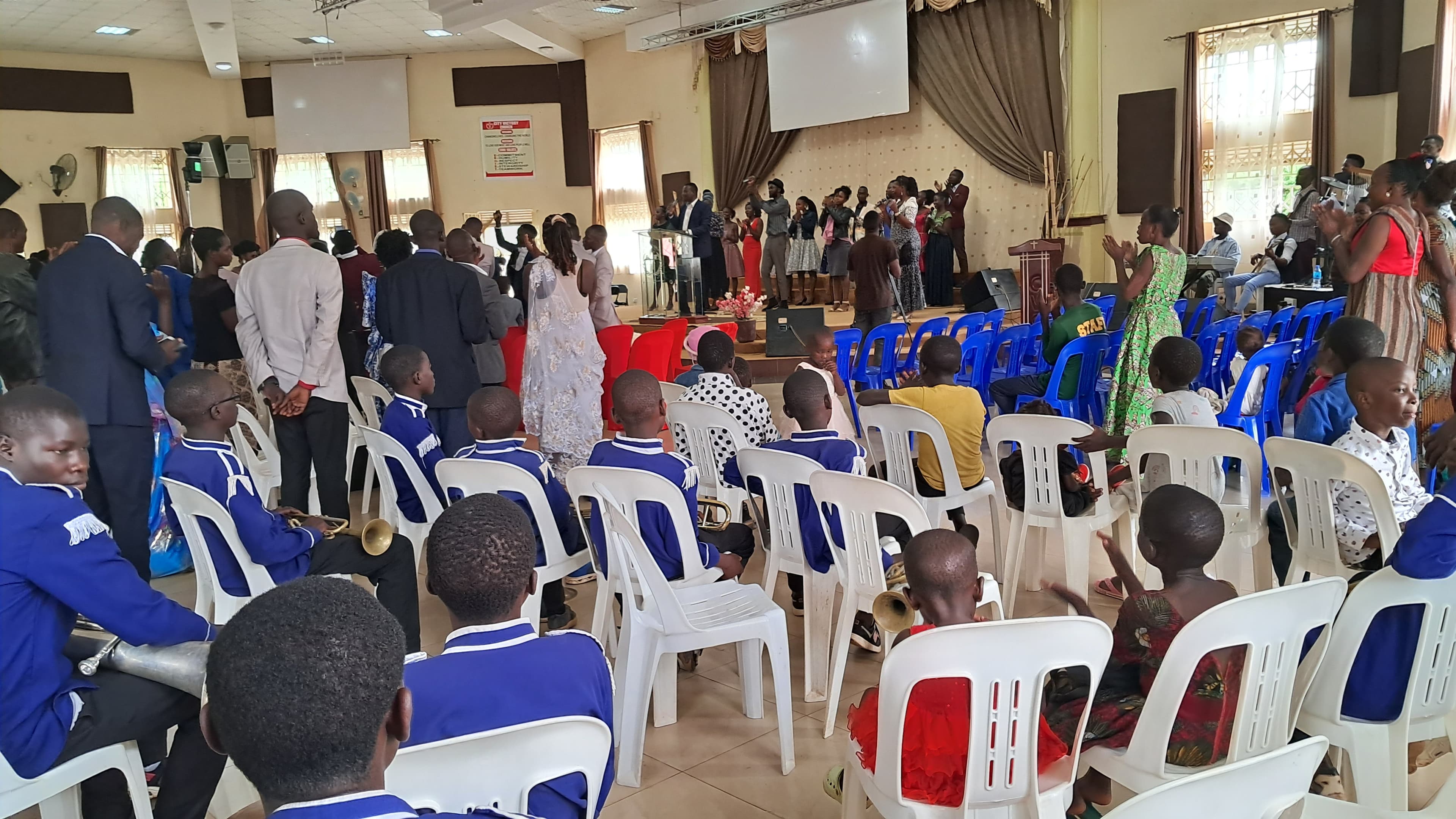 Elgon Youth Brass Band performing at a wedding ceremony